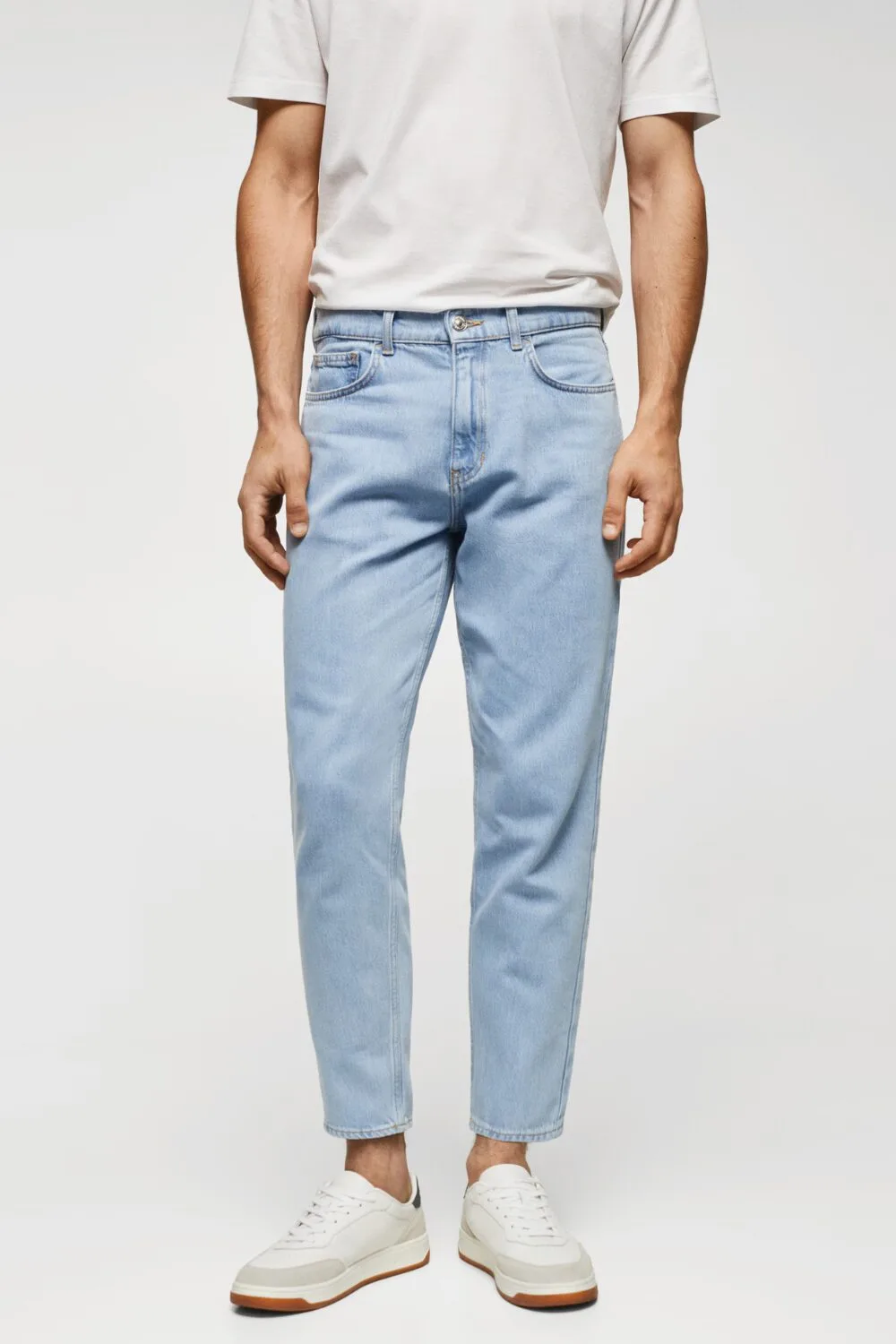 Light blue lightweight jeans — a summer essential for cooler evenings or indoor settings with A/C.