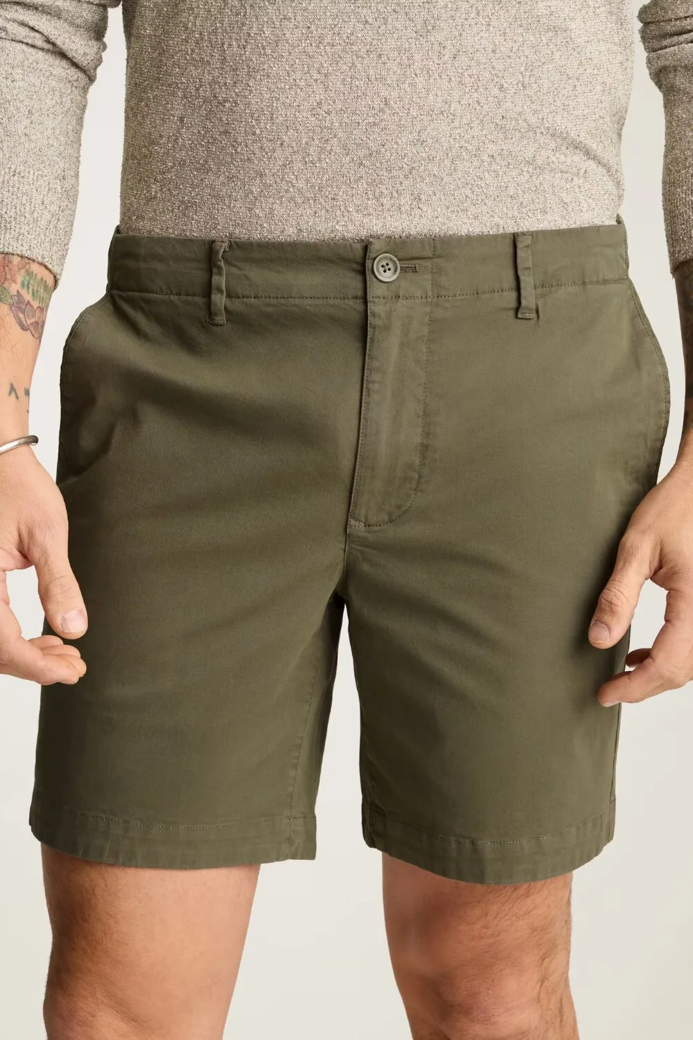 Olive chino shorts — an earthy tone that fits right into summer color trends.