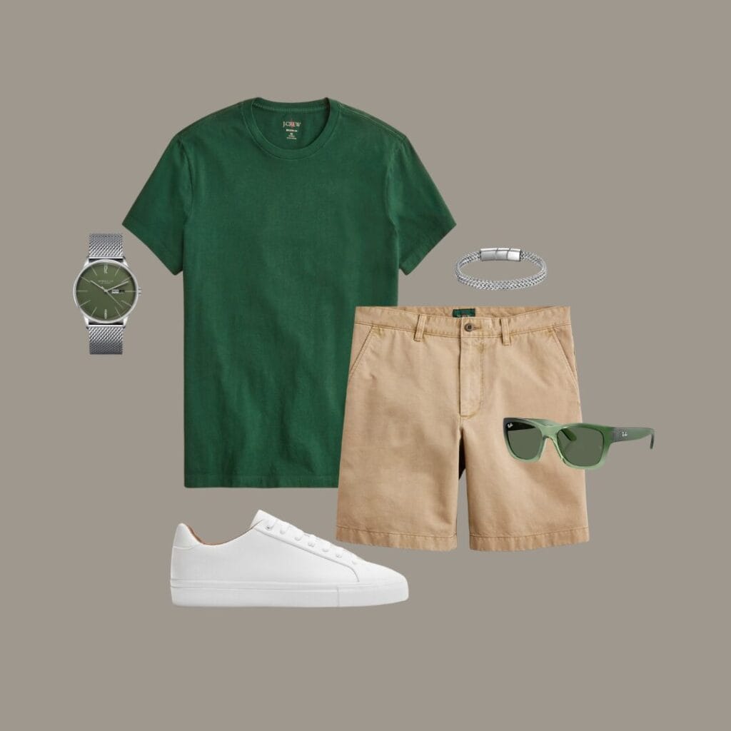 Men's casual summer outfit for backyard BBQs, casual meetups, or running errands around town, featuring an olive green cotton T-shirt, khaki chino shorts, clean white sneakers, a simple bracelet or watch, and sunglasses.