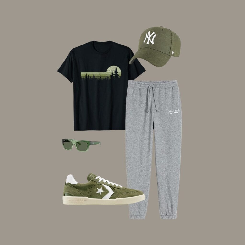 Men's casual summer outfit for hanging out with friends, casual shopping trips, or weekend coffee runs, featuring a black graphic T-shirt, gray lightweight cotton joggers, an olive baseball cap, and matching olive sunglasses.