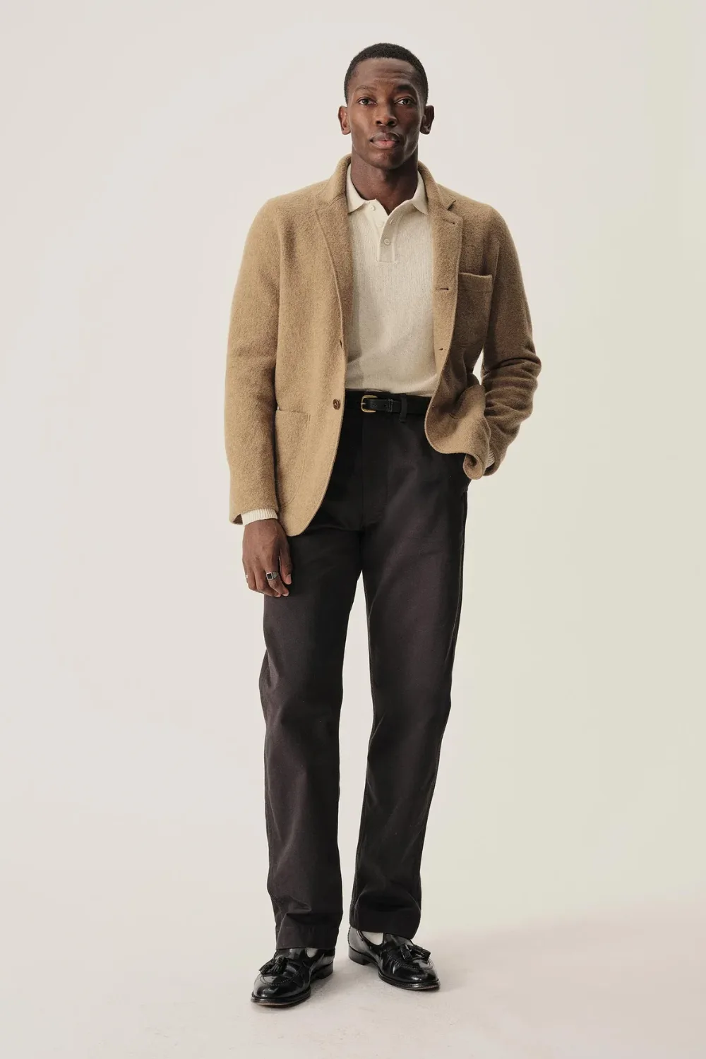 Model wearing Buck Mason Felted Chore Coat in beige