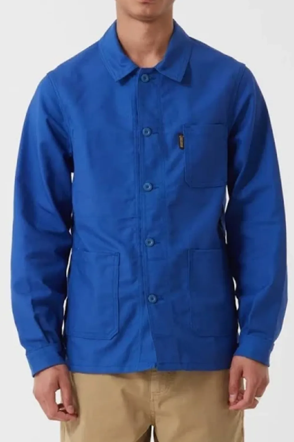 Model wearing Le Laboureur Cotton Work Jacket in blue