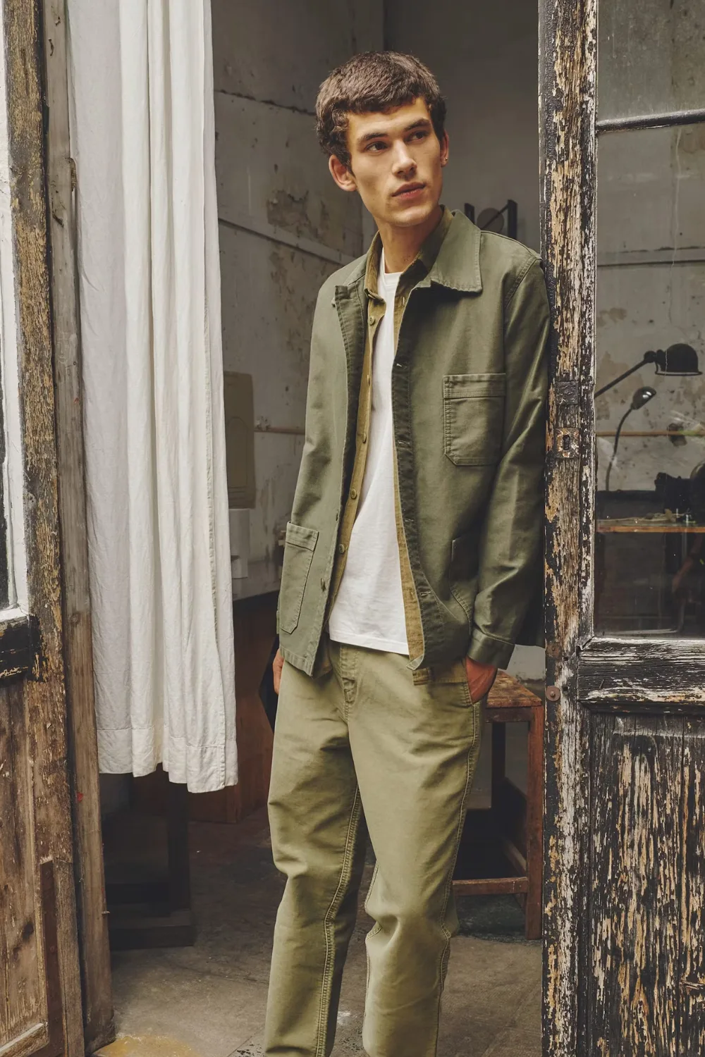 Model wearing Le Mont Saint Michel French Moleskin Work Jacket in green