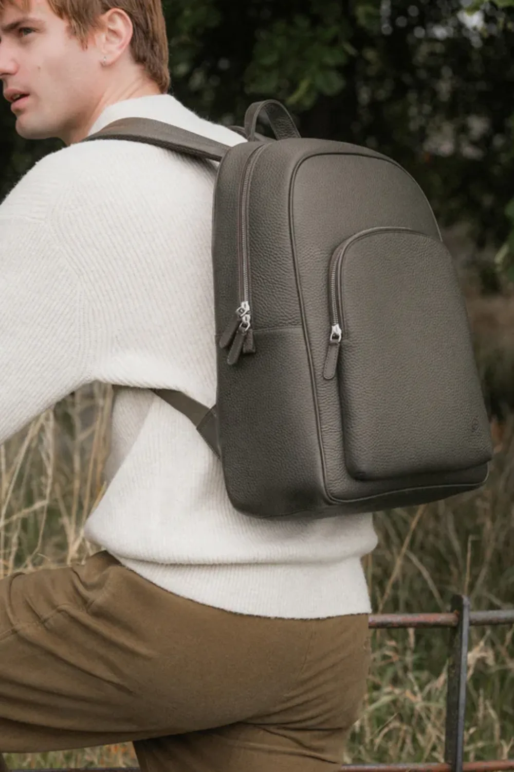 Man Wearing Carl Friedrik Ayrton Backpack in Olive