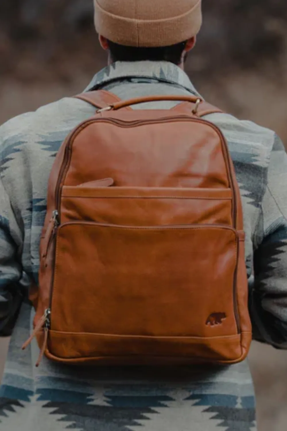 Man Wearing Kodiak Leather Katmai Backpack in Tan