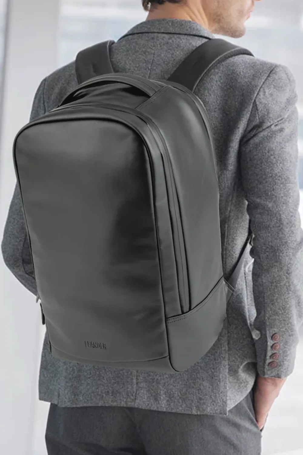 Man Wearing Leander Everyday Professional Backpack in Black