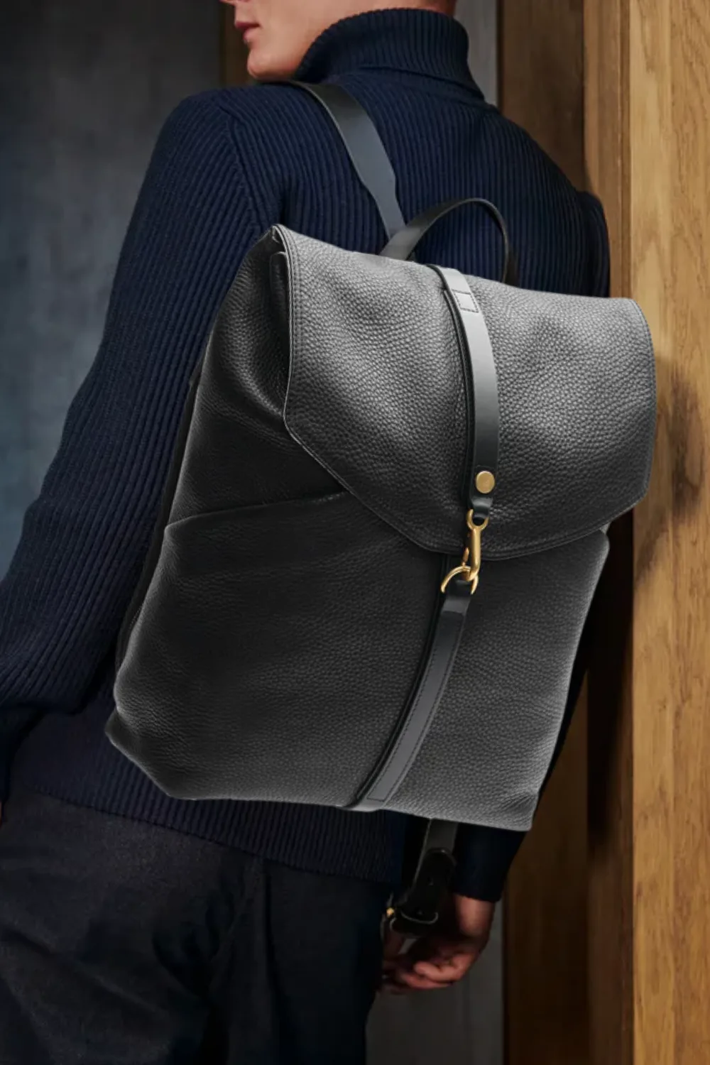 Man Wearing Mismo Black Structured Full-Grain Leather Rucksack in Black