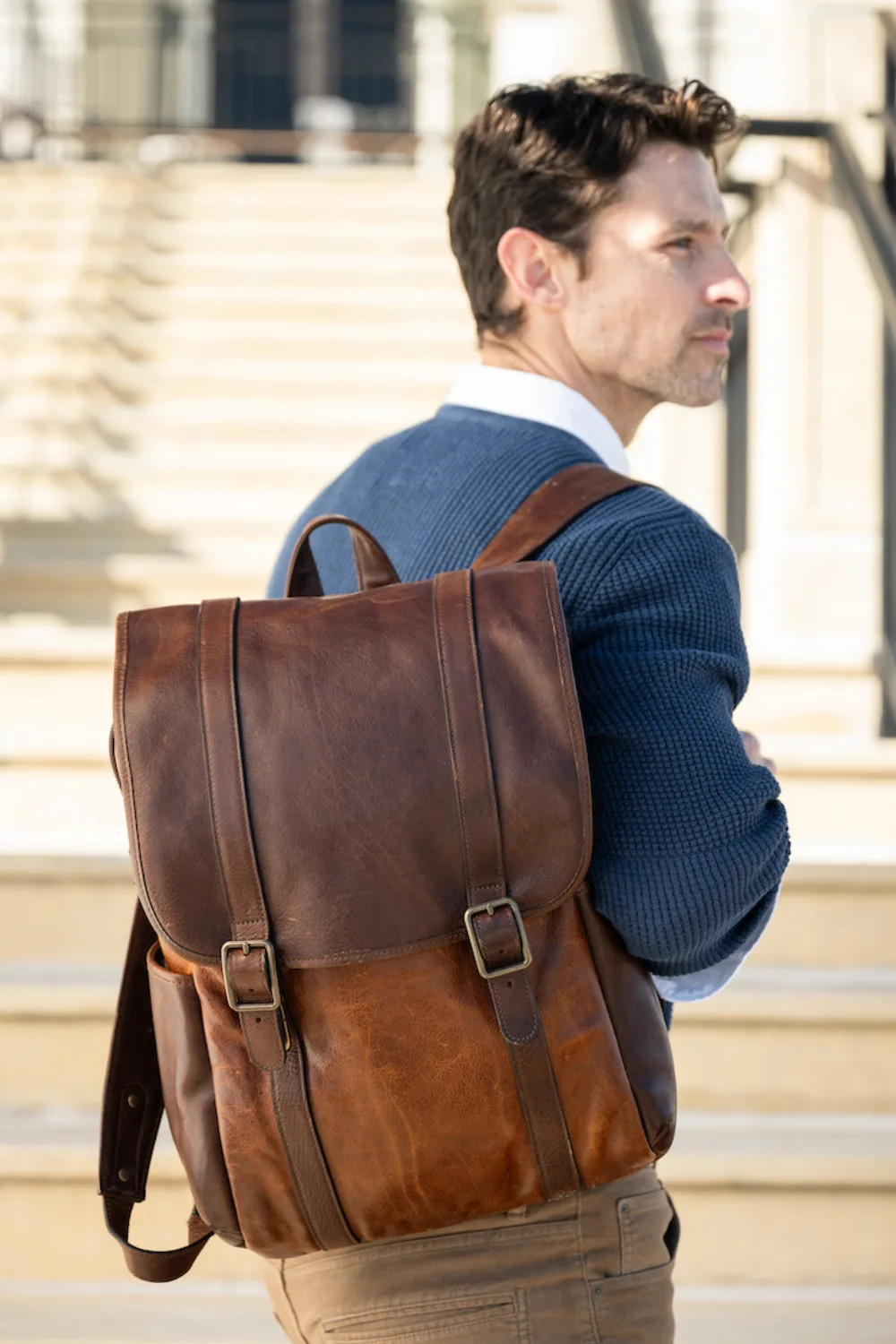 Man Wearing Moore & Giles Crews Backpack in Dark Brown