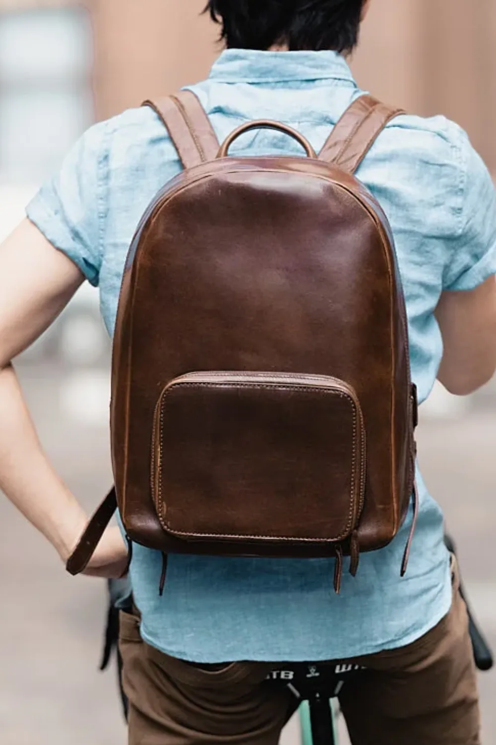 Man Wearing Satchel & Page Leather Laptop Backpack in Chestnut