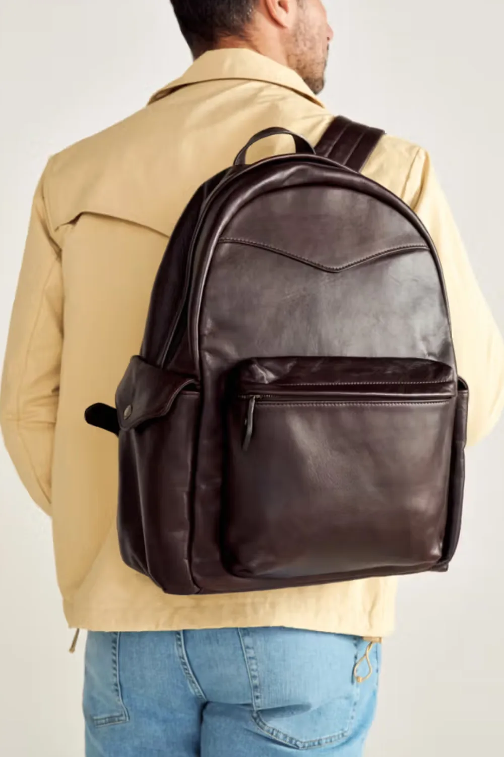 Man Wearing Tecovas Men's leather Backpack in Dark Brown