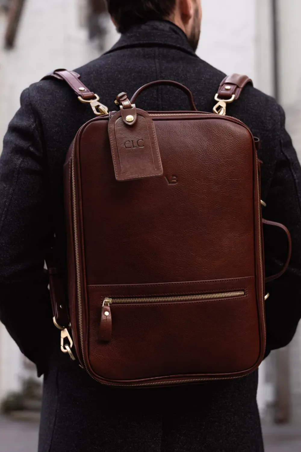 Man Wearing Von Baer Tallinn 10x Leather Laptop Travel Bag in Solid Brown