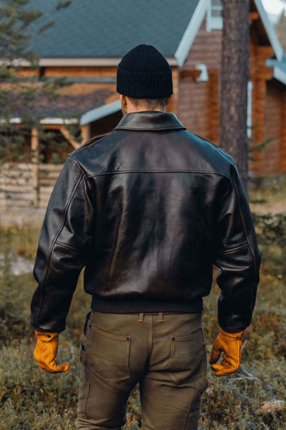 Back View of a man wearing Cockpit USA 100 Mission A-2 Pilot's Jacket in Dark Brown