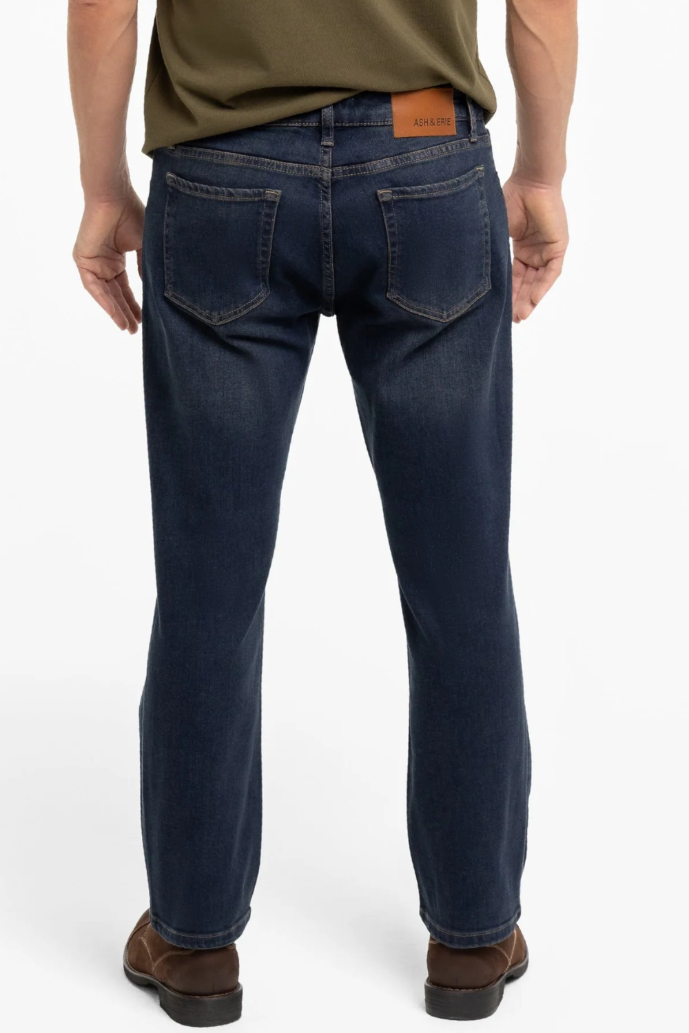 A man wearing Ash & Erie Straight Fit Jeans in dark wash, shown from the back.