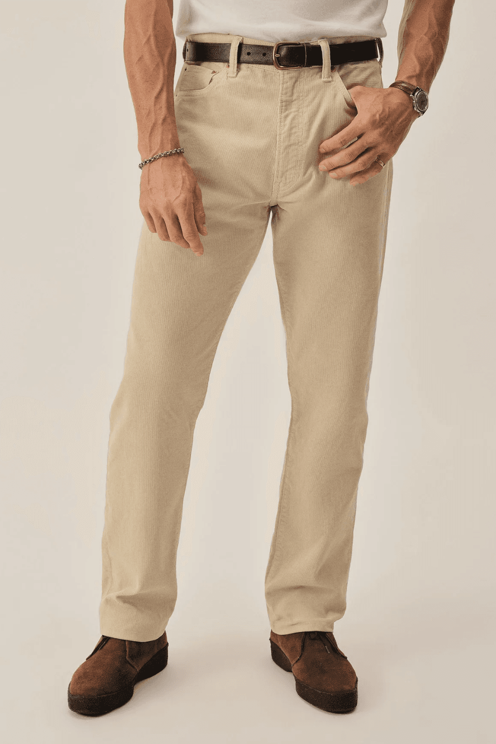 Man wearing Buck Mason Craftsman Corduroy Ford Standard Jean in Stone