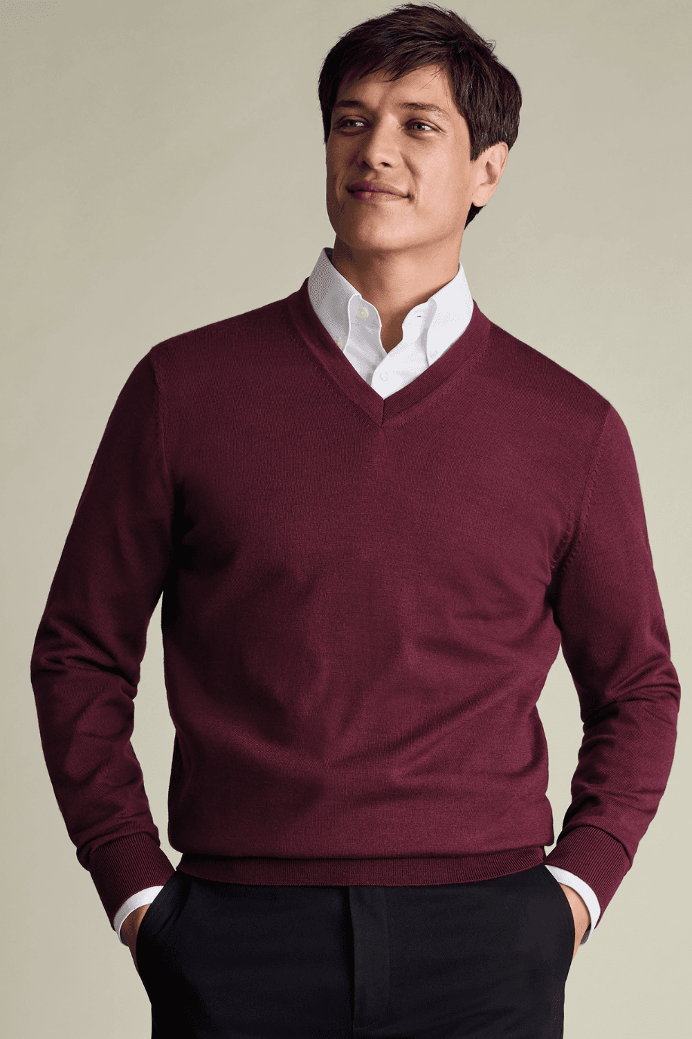 Man wearing Charles Tyrwhitt Pure Merino V-Neck Sweater in Burgundy