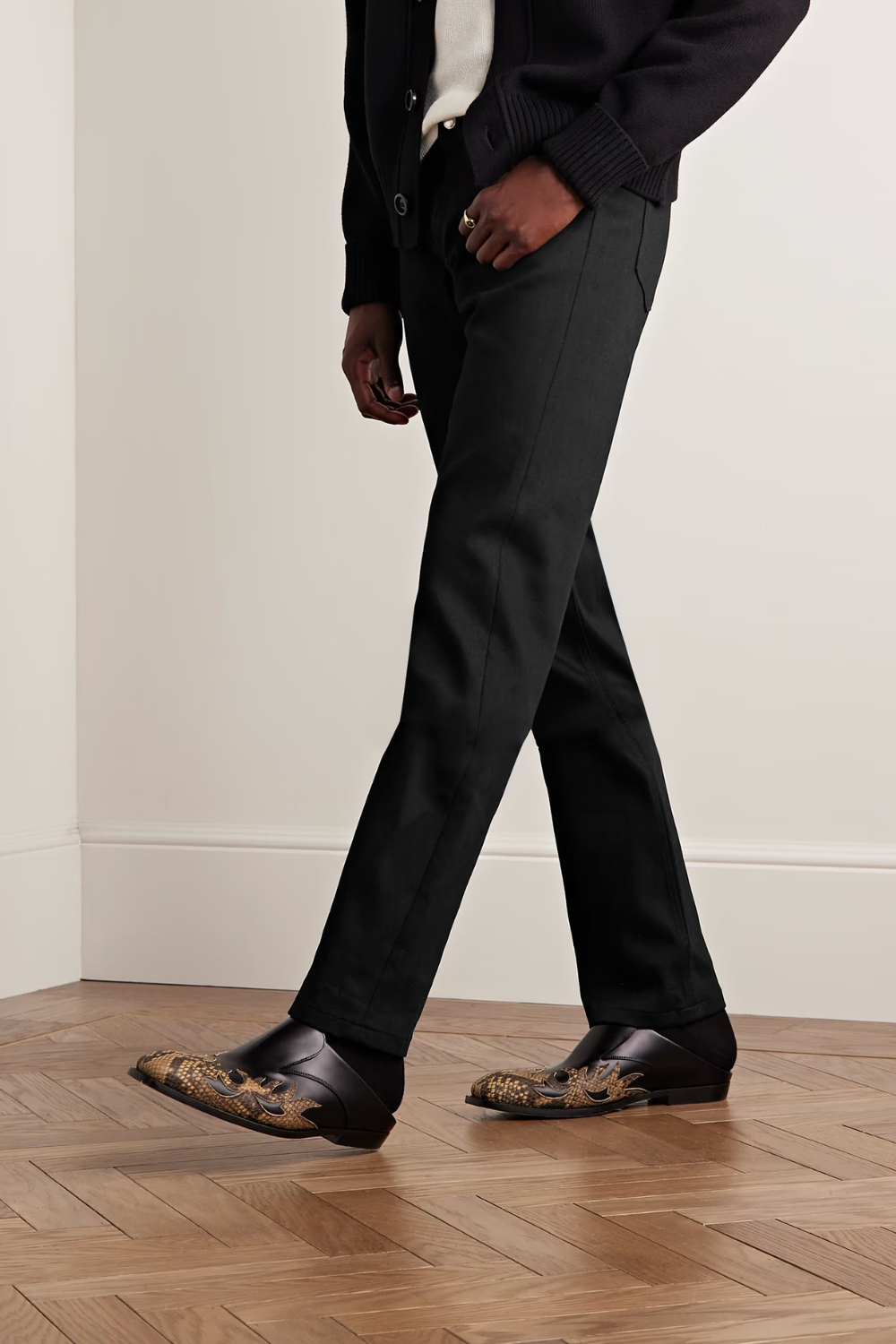 A man wearing A.P.C. New Standard Black Straight Leg Jeans, shown from the front.