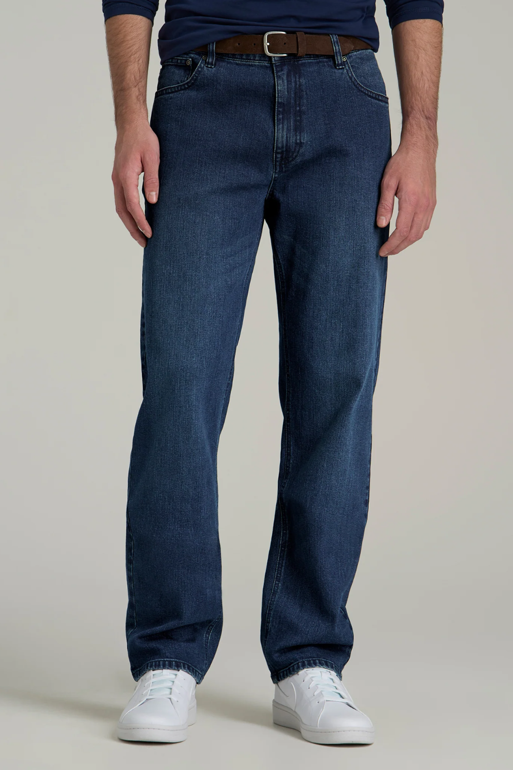 A man wearing American Tall J1 Straight Leg Jeans in Atlantic Blue, shown from the front.
