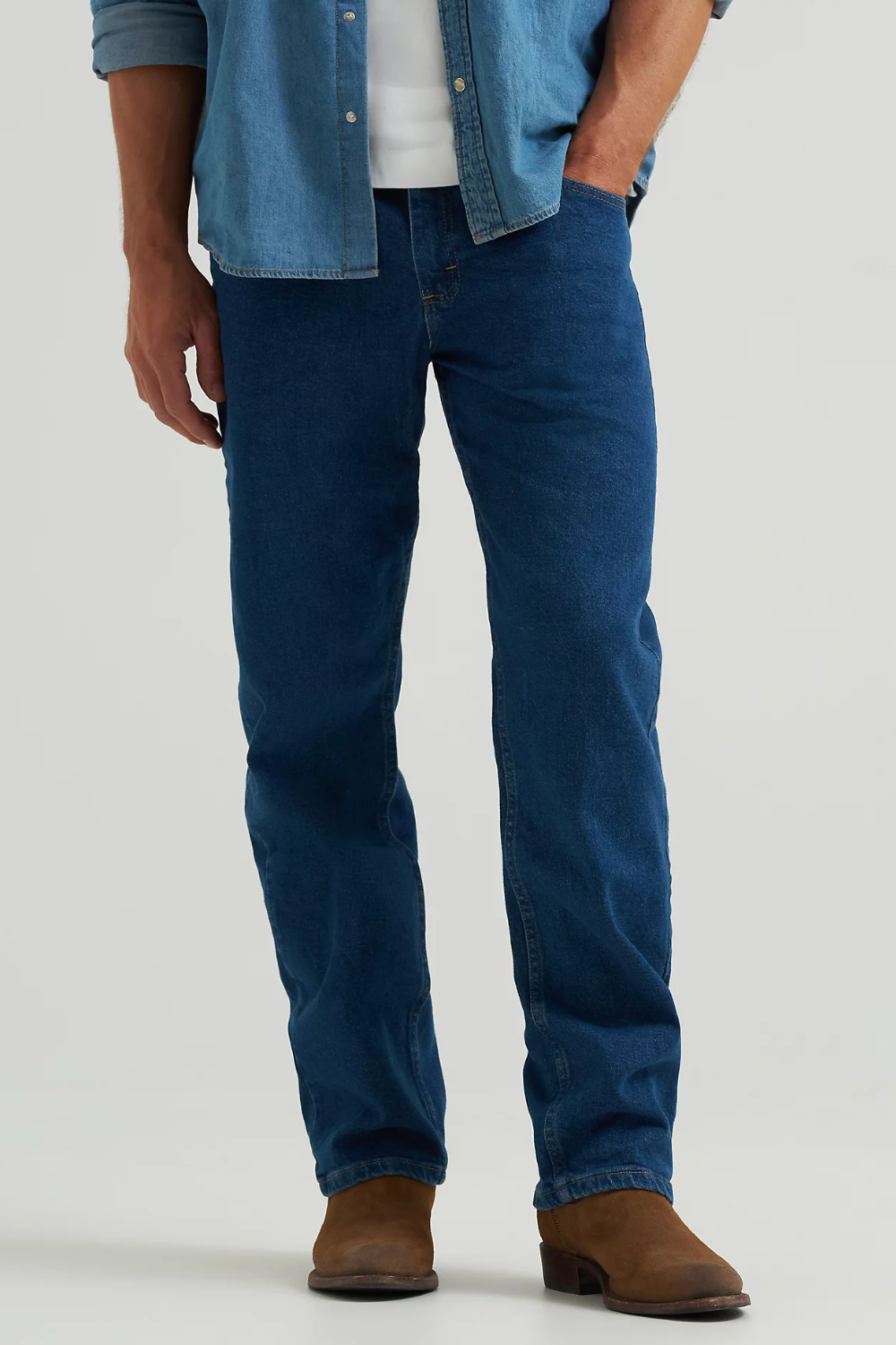 A man wearing Wrangler Men's Relaxed Fit Flex Jeans in Blue, shown from the front.