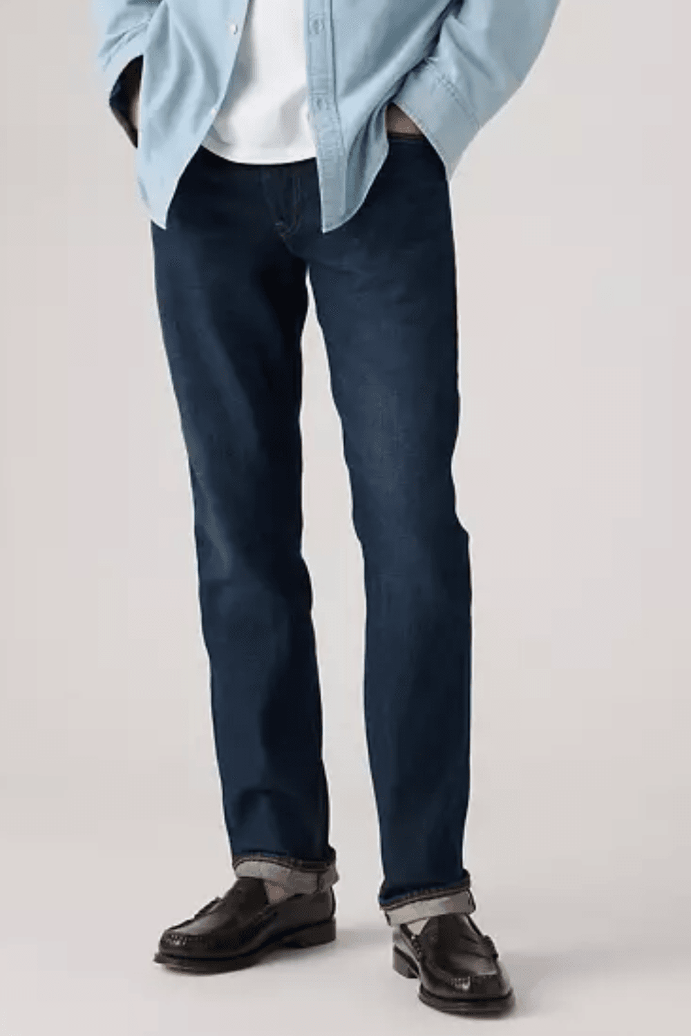 Man wearing Levi’s 511 Slim‑Fit Stretch Selvedge, Dark Indigo