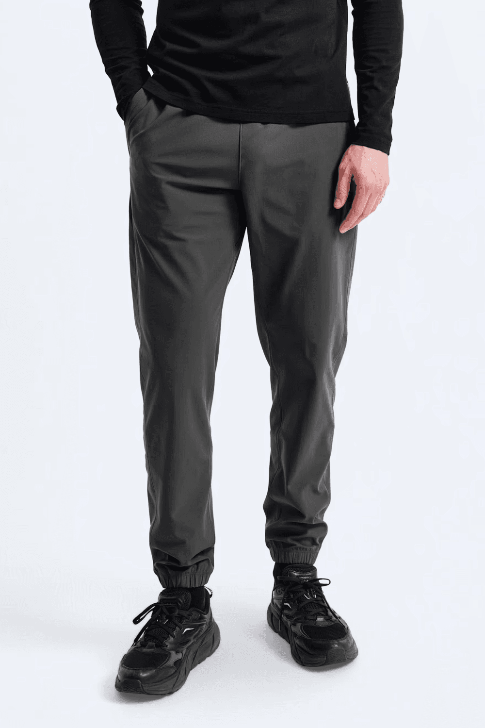 Man wearing Reigning Champ Coach's Classic Jogger in Carbon