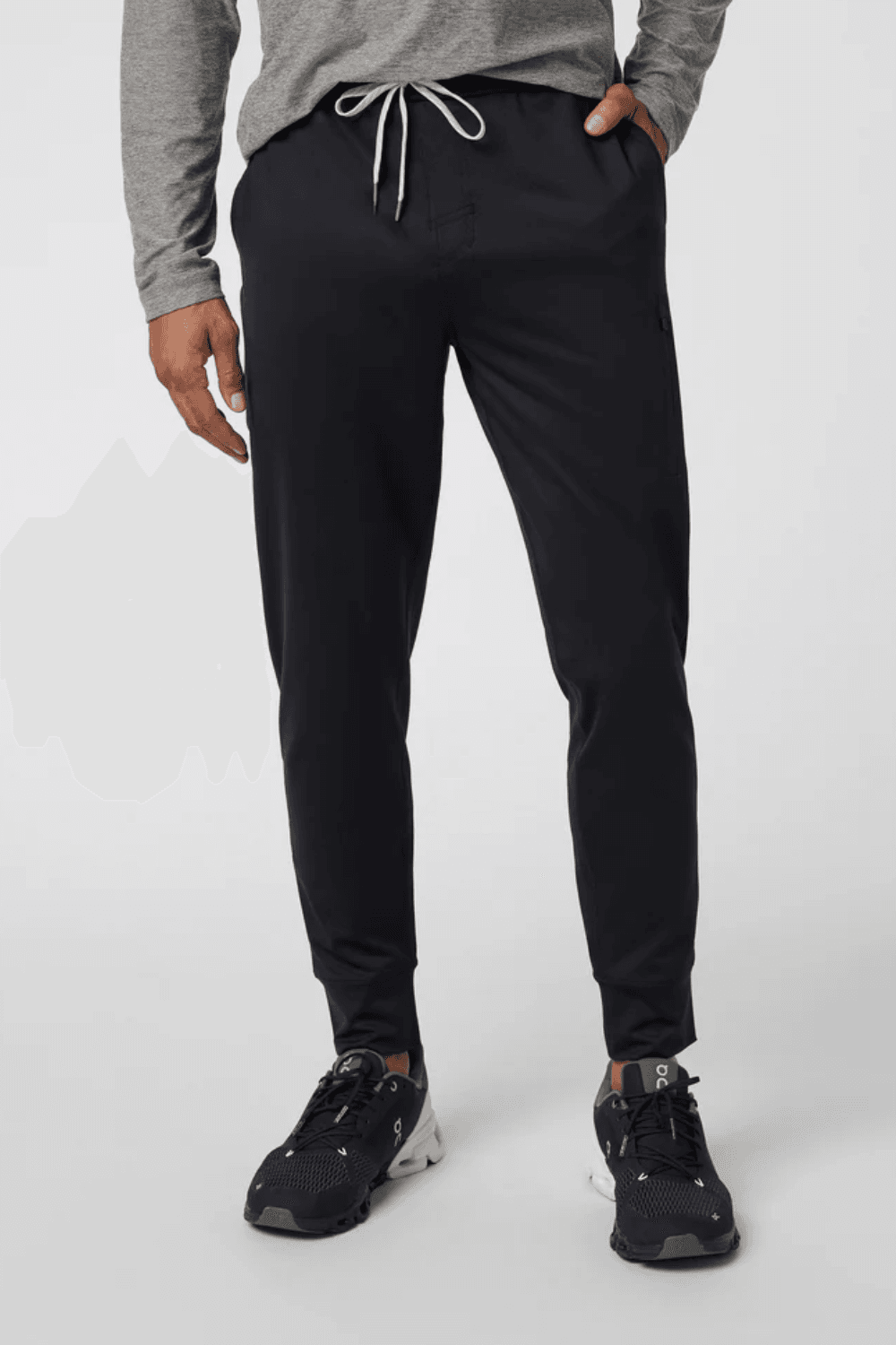 man wearing Vuori Sunday Performance Jogger in Black