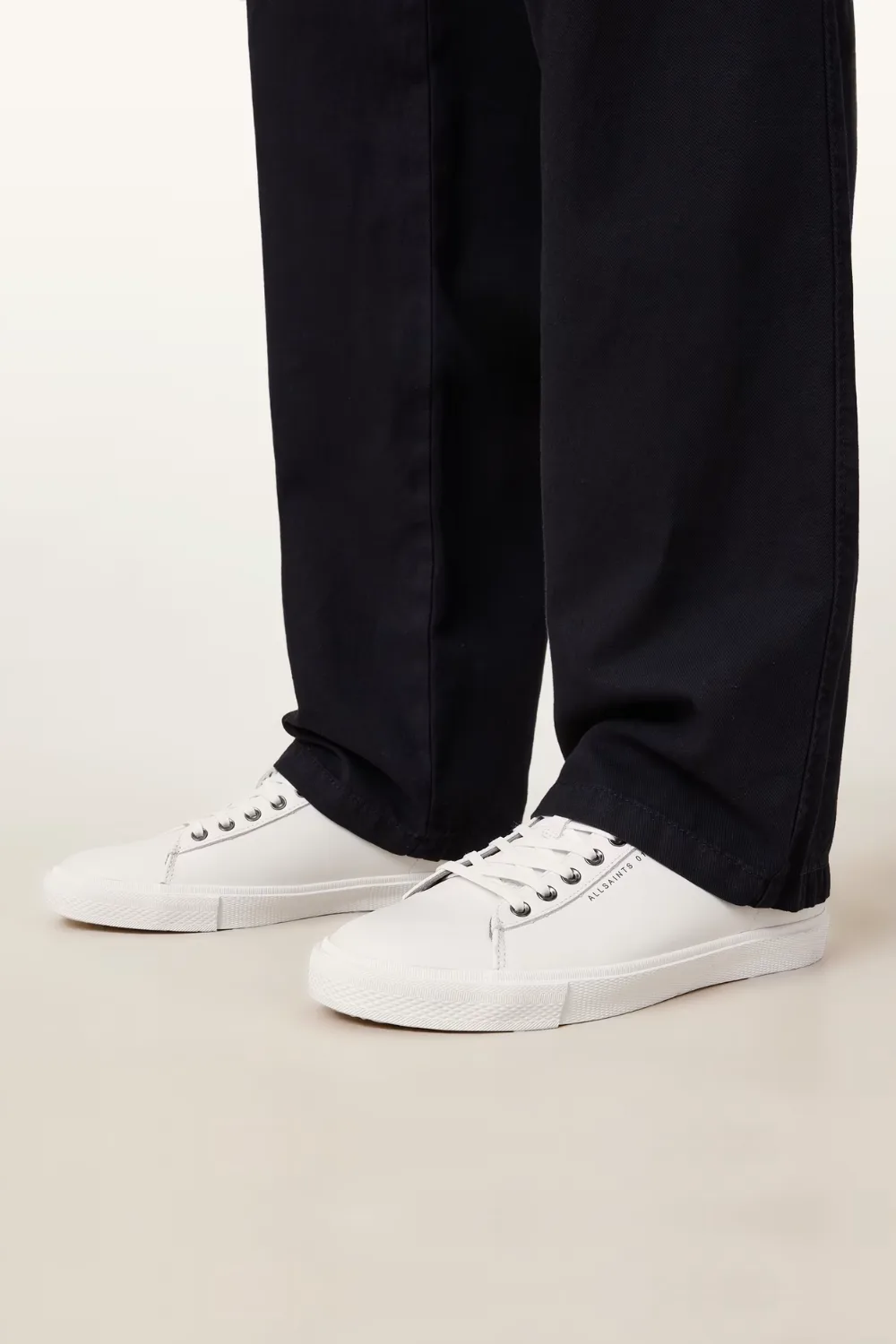 Man Wearing AllSaints Brody Leather Low Top Sneakers in White