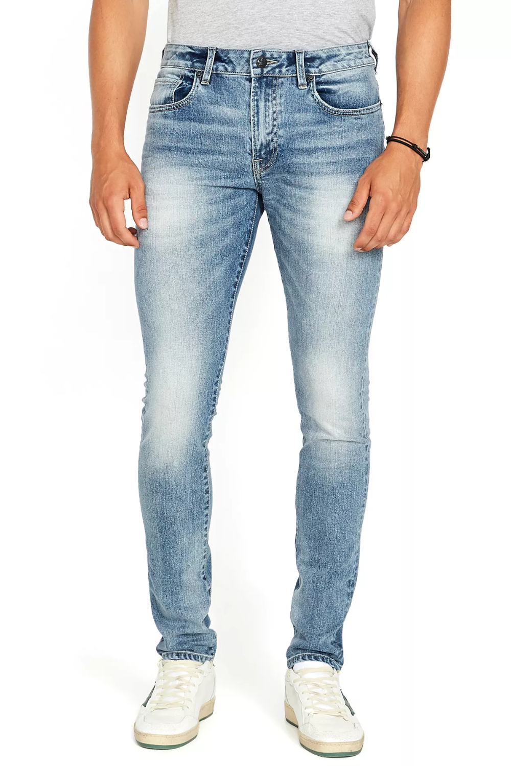 Man Wearing Buffalo David Bitton Men's Skinny Max Stretch Jeans in Washed Blue