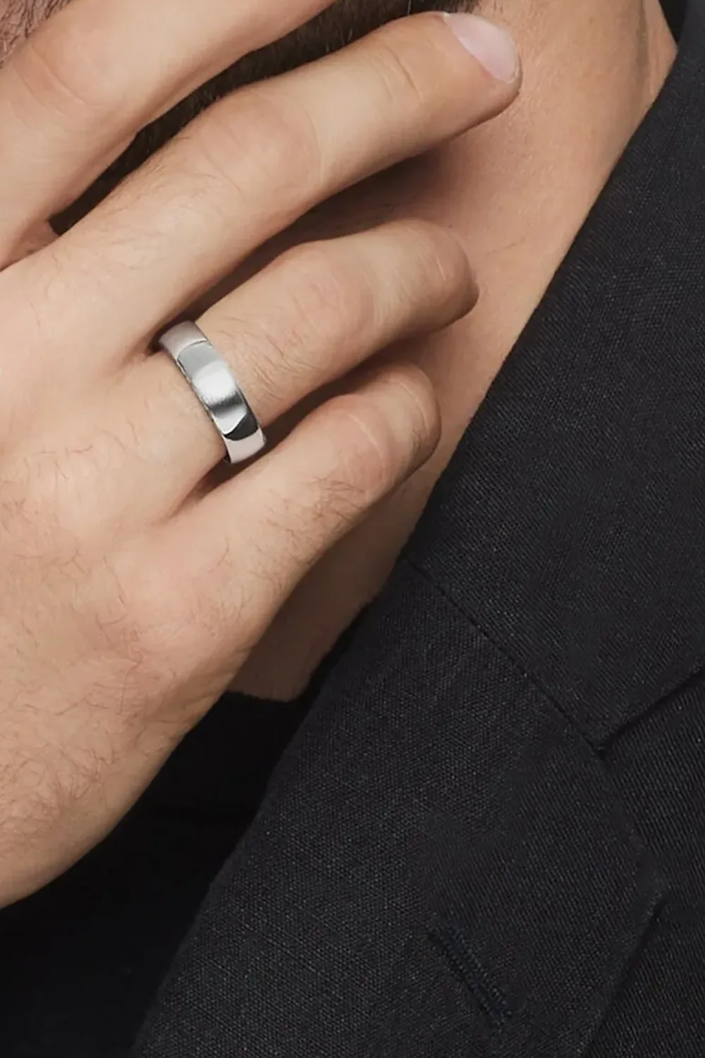 Close-up of the David Yurman Streamline Band Ring crafted in polished sterling silver, showing its smooth surface and refined curvature.