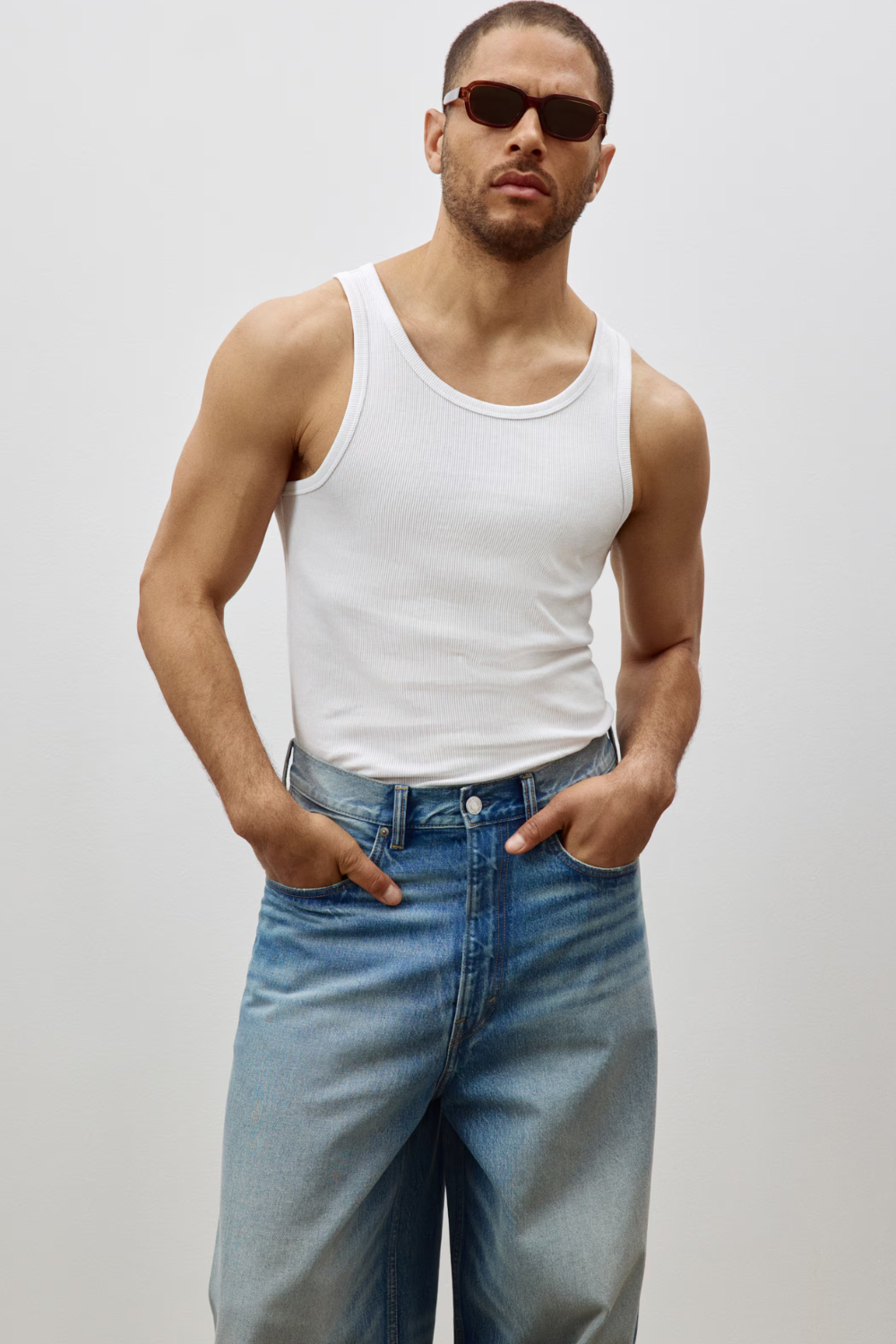 Man Wearing H&M Slim Fit Ribbed Tank Top in White