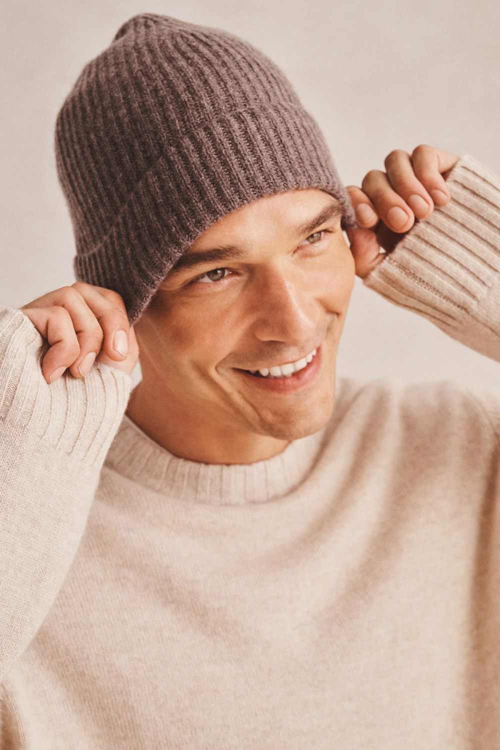 Man Wearing Naadam Cashmere Beanie in Brown