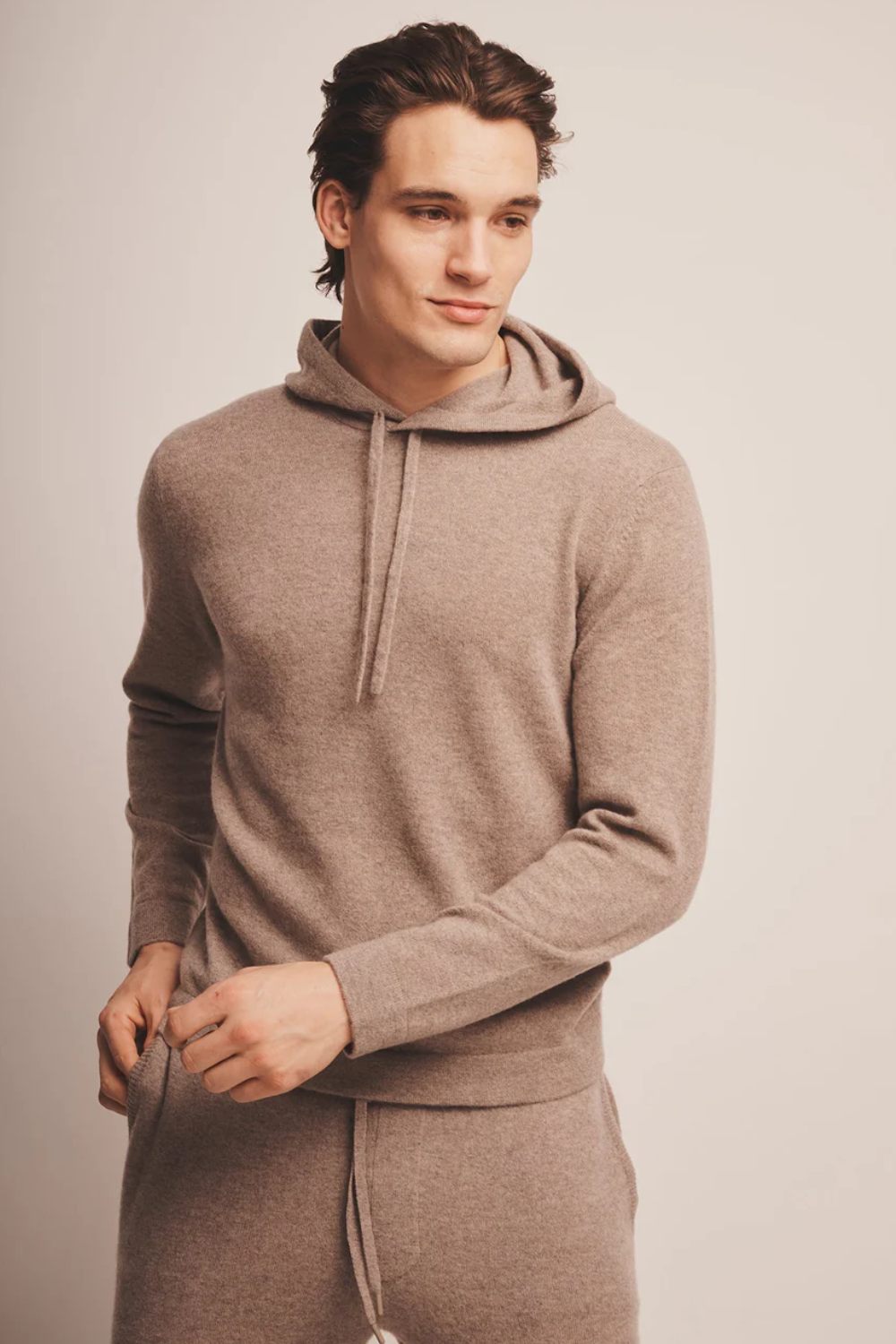 Man Wearing Naadam Signature Cashmere Hoodie in Timber