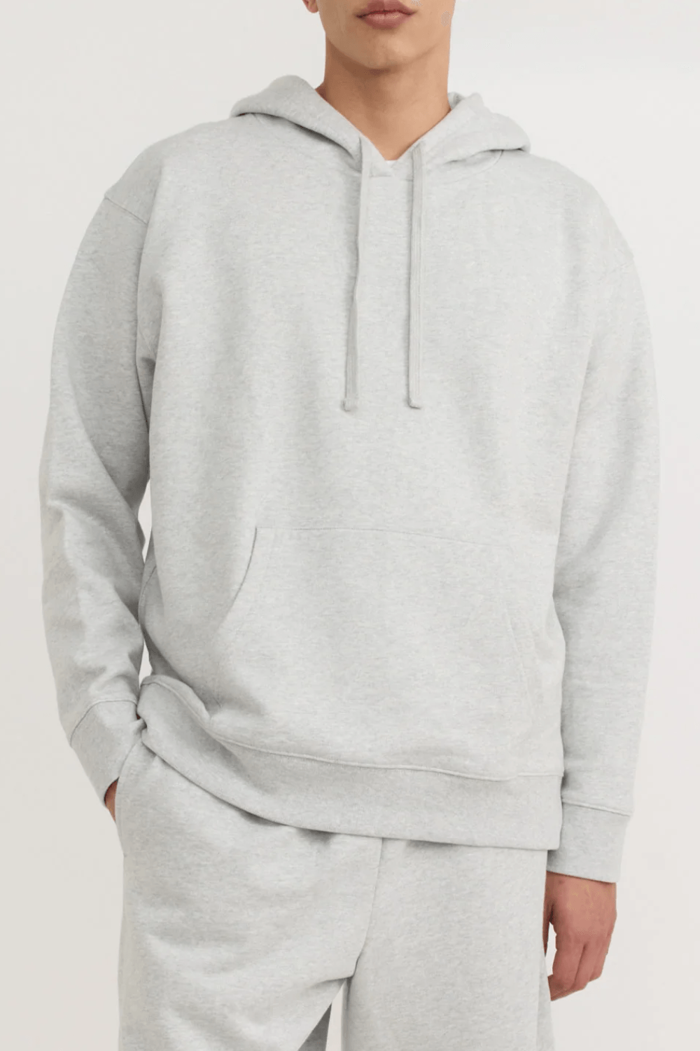 Man Wearing Organic Basics Weekend Hoodie in Gray