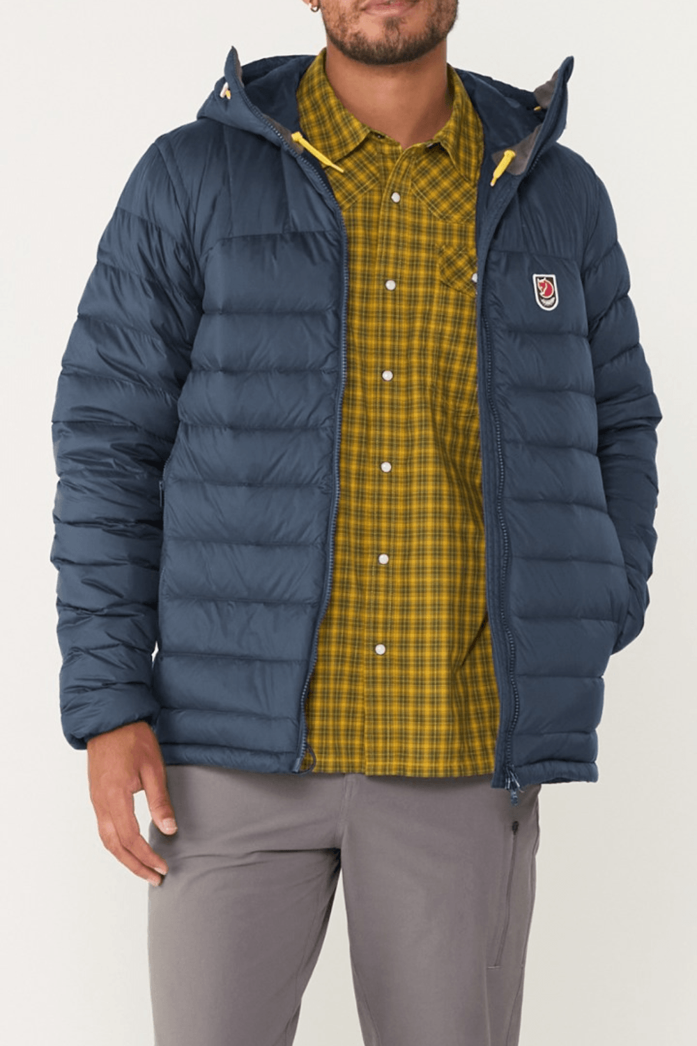 Man Wearing Fjallraven Expedition Pack Down Hoodie in Navy