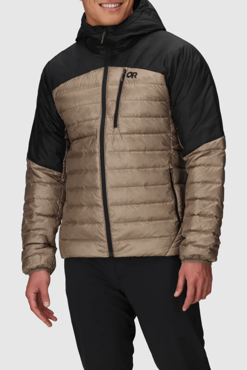 Man Wearing Outdoor Research Helium Down Hoodie in Brown