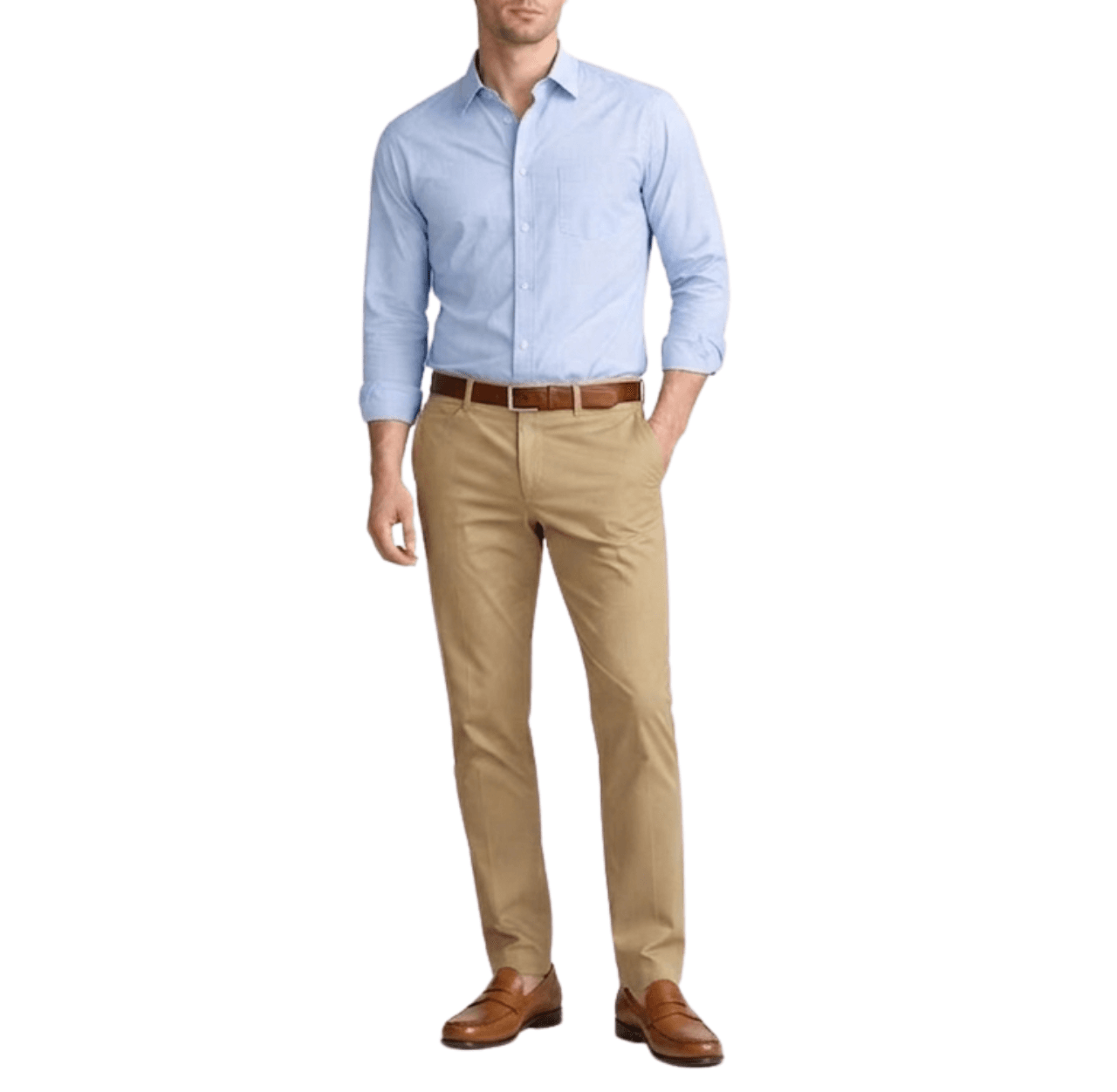 Man wearing a blue Oxford shirt tucked into khaki chinos with a tan leather belt and tan loafers, standing with one hand in his pants pocket.