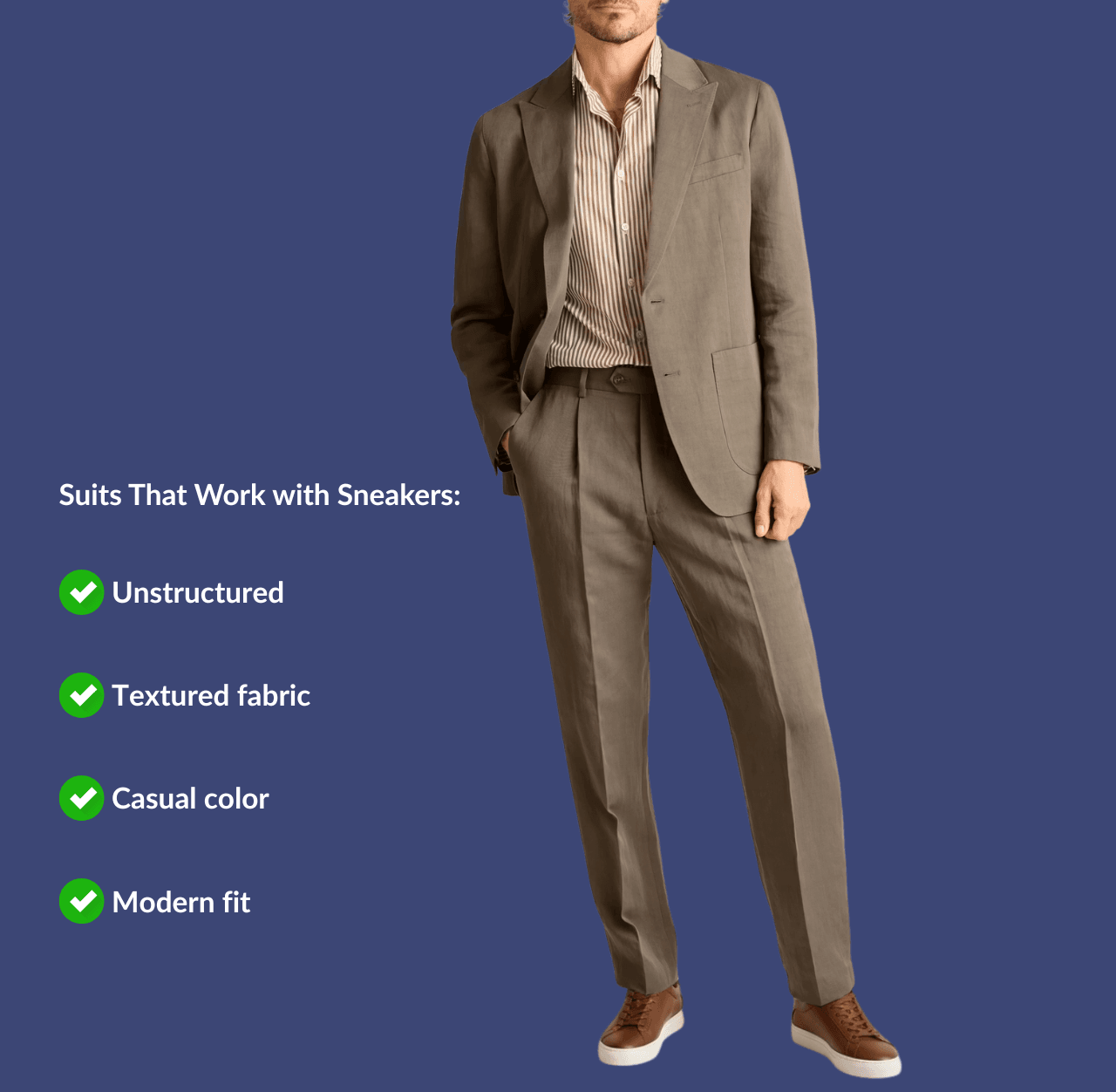 Man in a brown unstructured suit and tan leather sneakers with a hand in pockets, standing casually.