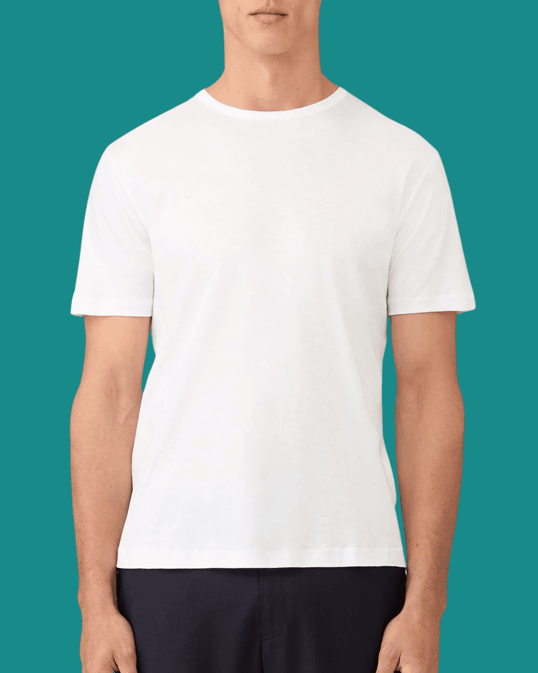 Man wearing Sunspel Sea Island Cotton White T-Shirt, standing casually with arms relaxed at his sides.