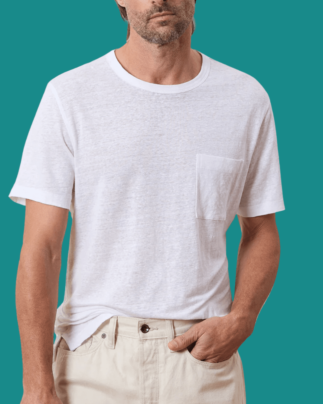 Man in Todd Snyder Linen Pocket White Tee with a hand in pockets, standing casually.
